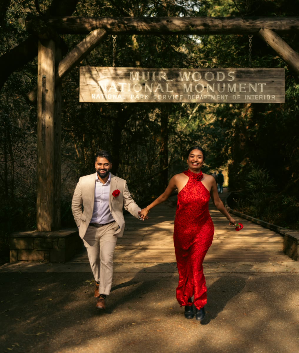 Nish and Pooja walking hand in hand at Muir Woods